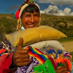 Peruvian man holding goods