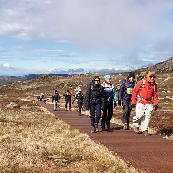 Trekkers following the path in Mt Kosciuszko National Park