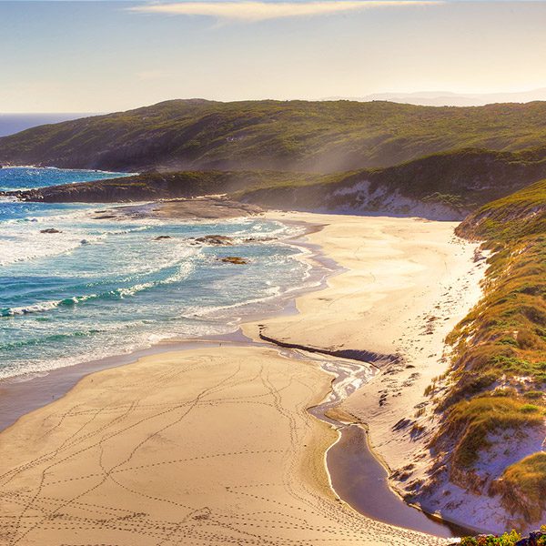 Aerial sunset view of stunning Conspicuous Beach along Bibbulmun Track, Western Australia.