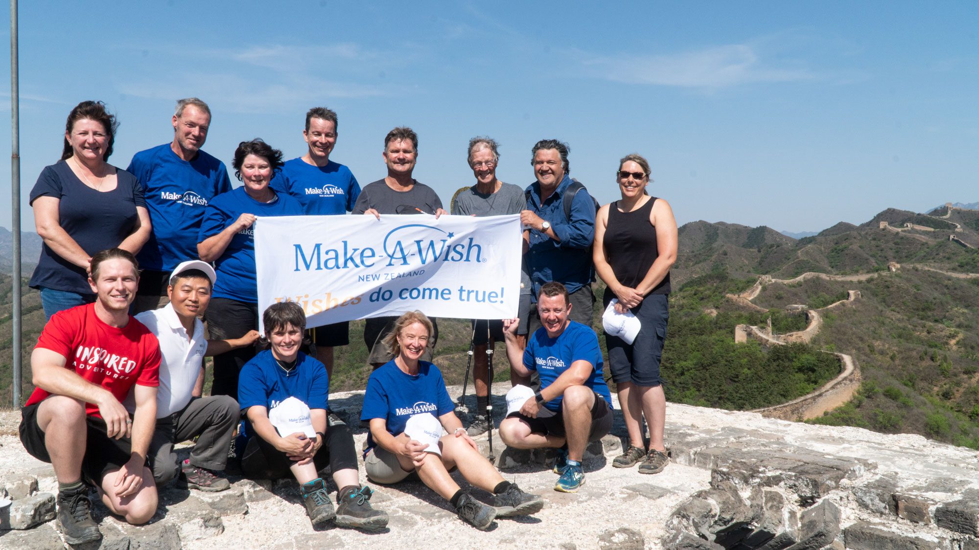 Team photo for Make-A-Wish Foundation on the Great Wall of China