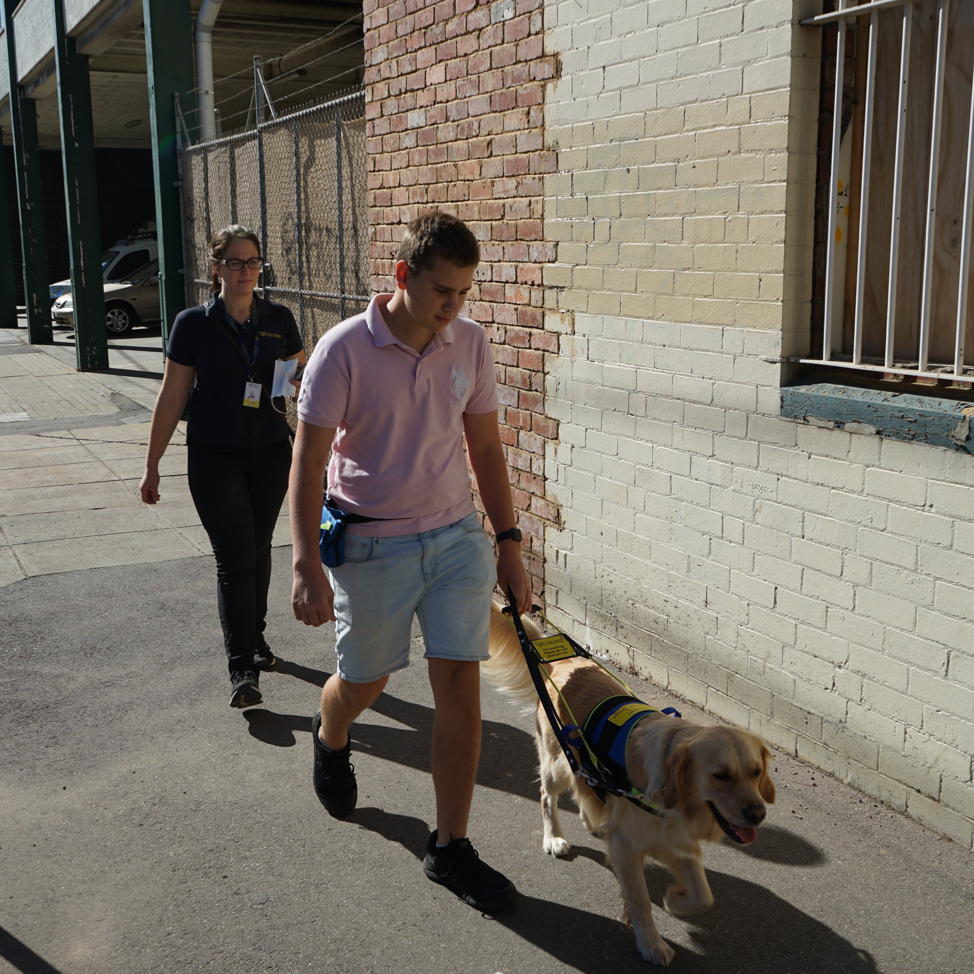 A Vision Australia client working with Brooke. A Vision Australia client working with Brooke.